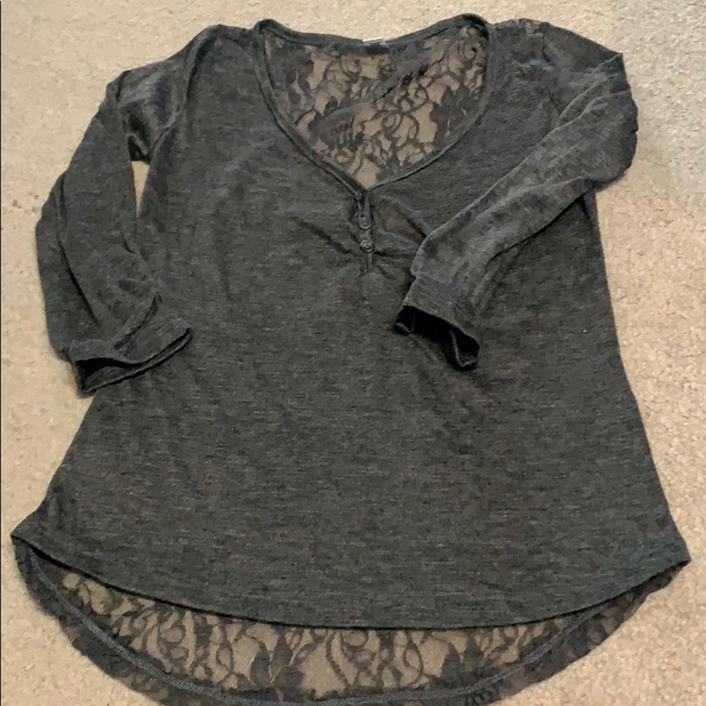 Lace back 3/4 length sleeve top.